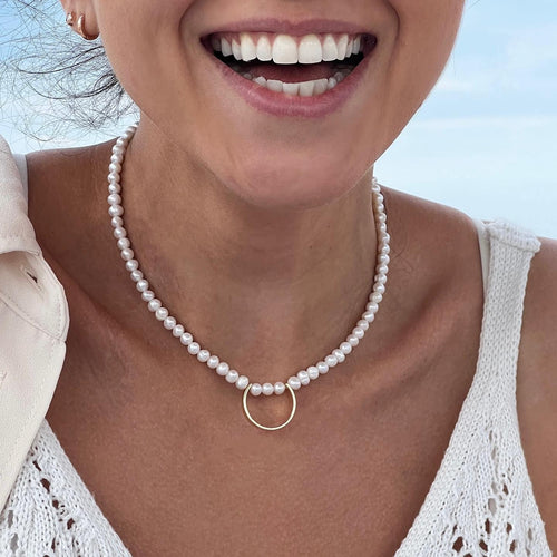 Radiance pearl necklace with gold ring pendant